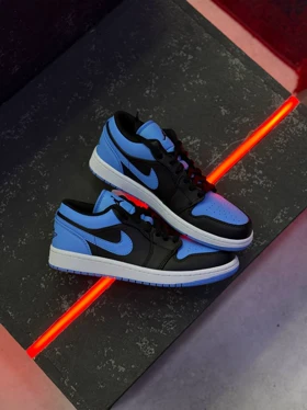 کتانی نایک ایر جردن 1 بدون ساق یونیورسیتی آبی مشکی Nike Air Jordan 1 Low University Blue sneakers