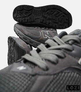 کفش کتانی بزرگ پا طوسی سیر NEW BALANCE 2002R