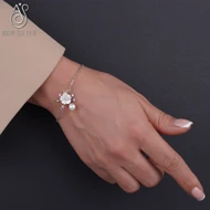 دستبند نقره طرح گل و صدف طبیعی