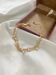 دستبند مرواریدی چند لاین