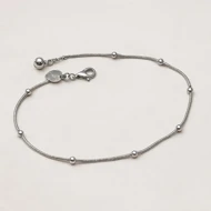 پابند استیل نقره‌ای زنانه مدل مینیمال با مهره برجسته – Xuping