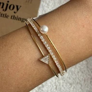 بنگل نازک طلایی مثل نگین‌دار و مروارید