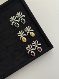 گوشواره جواهری پاپیونی آویزدار تمام نگین