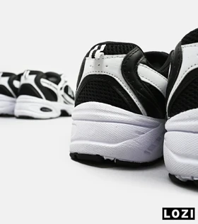 کفش کتانی مردانه و زنانه سفید مشکی NEW BALANCE 530