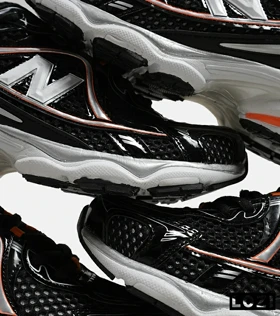 کفش کتانی مردانه و زنانه مشکی نارنجی NEW BALANCE 1064