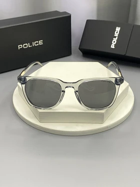 عینک آفتابی پلیس مدل 8815 با عدسی پلی‌کربنات پلاریزه فریم ترکیبی مقاوم و وزن فوق سبک