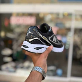 کتانی نیوبالانس 1065 مشکی سفید بزرگپا کد 6446