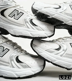 کفش کتانی مردانه و زنانه سفید نقره ای NEW BALANCE 530