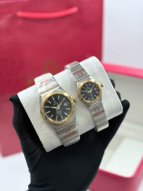 ساعت امگا زنانه نقره ای طلایی صفحه مشکی خطی