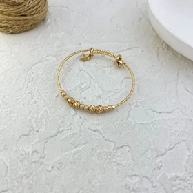 دستبند زنانه طرح طلا با گوی‌های برجسته برند ژوپینگ