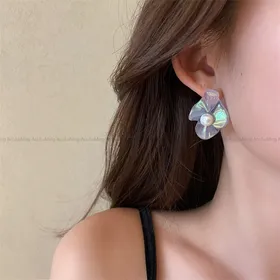 گوشواره ژورنالی صدف