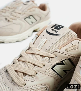 کفش کتانی مردانه و زنانه کرم NEW BALANCE 530