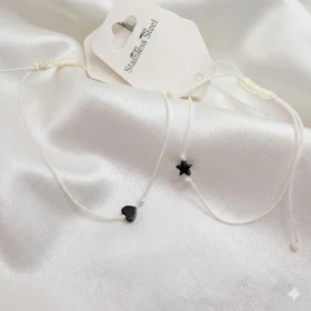 دستبند نخی طرح «تک‌ستاره» و «قلب» | پلاک استیل سیلور با بند سفید/شیری