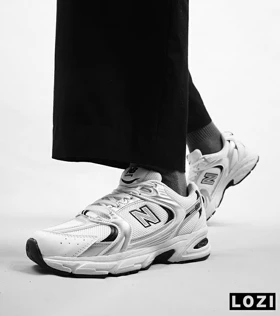 کفش کتانی مردانه و زنانه سفید نقره ای NEW BALANCE 530