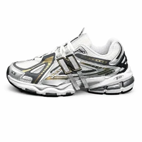 کتانی مردانه نیوبالانس 1906 طوسی مشکی طلایی New BALANCE 1906A