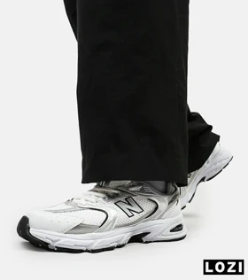 کفش کتانی بزرگپا سفید نقره ای NEW BALANCE 530