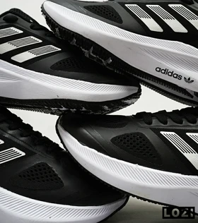 کفش کتانی مردانه و زنانه مشکی سفید Adidas SWIFT