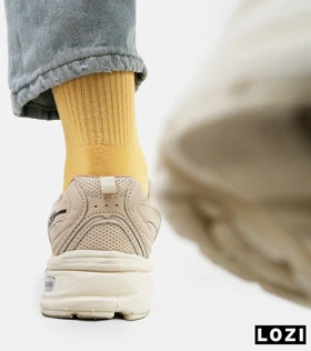 کفش کتانی مردانه و زنانه کرم NEW BALANCE 530