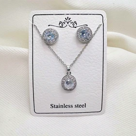 نیم‌ست استیل نقره‌ای طرح «خورشیدی گرد» (گردنبند + گوشواره) | اقتصادی و درخشان