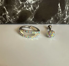 پک 2 عددی پیرسینگ گوش استیل مدل گوی و حلقه بیضی هفت‌رنگ