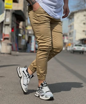 شلوار اسلش جاگر کتان کش کرم با کیفیت فوق‌العاده بالا