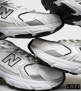 کفش کتانی مردانه و زنانه سفید نقره ای NEW BALANCE 530