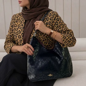 کیف زنانه دوقلو COACH (کوچ) کویین پلنگی