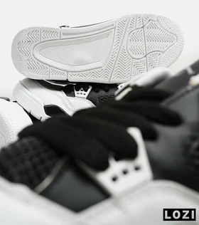 کتانی ساق‌دار مردانه مشکی سفید Nike air jordan 4
