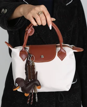 کیف زنانه کوچیک لانگ 147 AM (استخوانی)