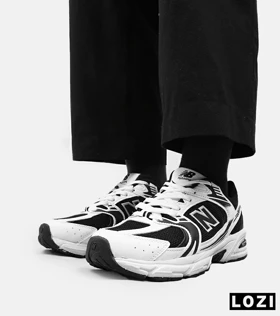 کفش کتانی مردانه و زنانه سفید مشکی NEW BALANCE 530