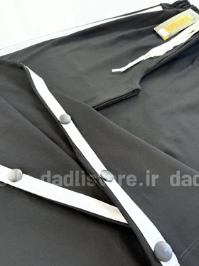 شلوار بگ تیپ دورس بغل دکمه چاک‌دار