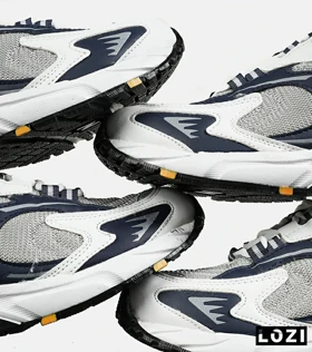 کفش کتانی مردانه و زنانه طوسی زرد مشکی NEW BALANCE 725 مدل 7387