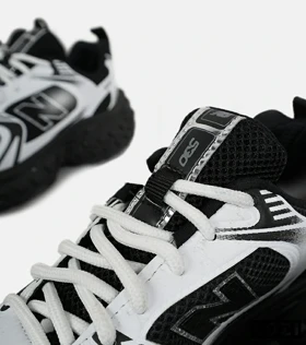 کفش کتانی مردانه و زنانه سفید مشکی NEW BALANCE 530 V02 مدل 7103