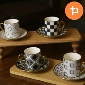 ست قهوه خوری شش نفره طرح دار سیاه و سفید دسته طلایی