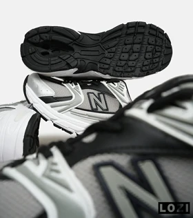 کفش کتانی مردانه و زنانه سفید طوسی مشکی NEW BALANCE 530