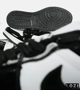 کفش کتانی مردانه و زنانه مشکی سفید ورنی NIKE jordan 1 مدل 6616