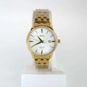 ساعت مچی مردانه سیکو Seiko 3227 تاریخ دار با ماندگاری رنگ بالا (بند طلائی صفحه سفید)