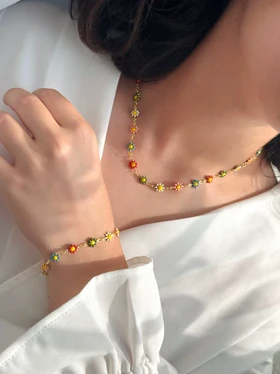ست گردنبند و دستبند بابونه رنگی