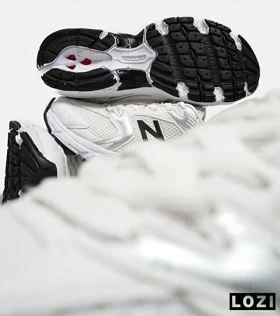 کفش کتانی مردانه و زنانه سفید نقره ای NEW BALANCE 530