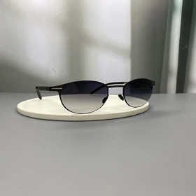 عینک آفتابی آیس‌برلین با فریم تیتانیوم و لنز پلی‌کربنات UV400 نشکن ic! berlin Titanium