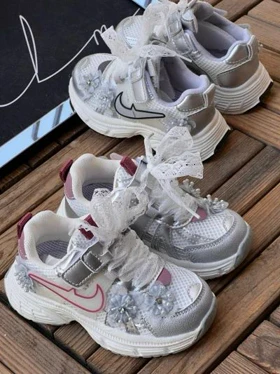 خرید کتانی بچه گانه طرح نایک گل‌دار