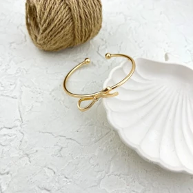 دستبند زنانه طرح طلا مدل بنگل پاپیونی