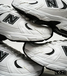 کفش کتانی مردانه و زنانه سفید مشکی NEW BALANCE 530