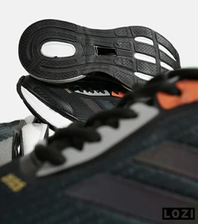 کفش کتانی مردانه و زنانه سبز مشکی Adidas PureBoost v02
