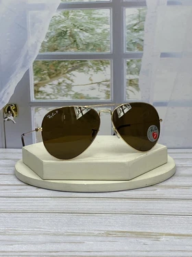 عینک آفتابی خلبانی ری‌بن مدل RB3025 پلاریزه فریم فلزی، عدسی کریستال سایز 60 (فریم طلایی عدسی قهوه ایی)