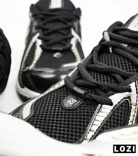 کفش کتانی مشکی طلایی Newbalance 1906R