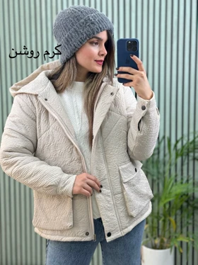 کاپشن کلاهدار زمرد