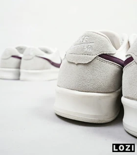 کفش کتانی مردانه سفید طوسی NIKE SB
