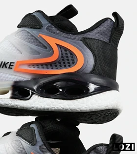 کفش کتانی مردانه و زنانه طوسی مشکی نارنجی NIKE AirMax Advantage