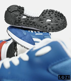 کفش کتانی آبی REEBOK Unphased Pro